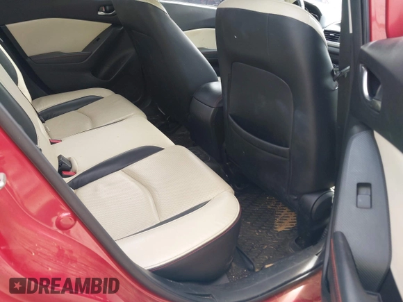 2015 Mazda 3 S Grand Touring z VIN JM1BM1W36F1250561, wystawiony jako IAAI lot #41628951 z przebiegiem 175 622 mil mil oraz . Historia ofert i sprzedaży dostępna na DreamBid. Obrazek 8.