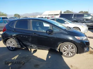 2016 Honda Fit EX with VIN JHMGK5H75GX006464, listed as a IAAI auction lot 41852218 with 30,990 mi miles and . Bid and sale history available at DreamBid. Image 13.