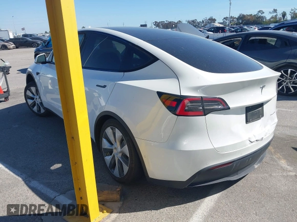 2020 Tesla Model Y Long Range with VIN 5YJYGDEE2LF044811, listed as a IAAI auction lot 41839136 with 68,445 mi miles and . Bid and sale history available at DreamBid. Image 3.