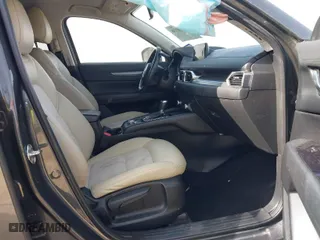 2019 Mazda CX-5 Touring with VIN JM3KFACMXK0686957, listed as a IAAI auction lot 41720338 with 95,421 mi miles. Bid and sale history available at carsss.com. Image 5.