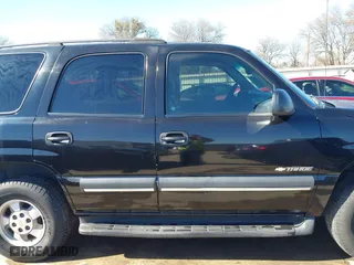 2003 Chevrolet Tahoe LS with VIN 1GNEC13V63R245581, listed as a IAAI auction lot 41599241 with 234,028 mi miles. Bid and sale history available at carsss.com. Image 13.