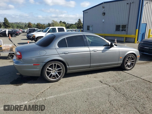 2005 Jaguar S-Type with VIN SAJWA01T15FN13800, listed as a Copart auction lot 53576305 with 182,533 mi miles and Salvage Title. Bid and sale history available at DreamBid. Image 3.