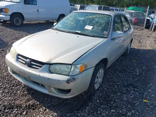 2001 Toyota Corolla CE with VIN 2T1BR12E61C473602, listed as a IAAI auction lot 42408733 with Not provided miles and . Bid and sale history available at DreamBid. Image 2.