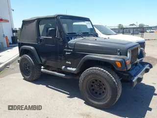 1998 Jeep Wrangler Sport z VIN 1J4FY19S8WP787240, wystawiony jako IAAI lot #42235238 z przebiegiem 163 069 mil mil oraz . Historia ofert i sprzedaży dostępna na DreamBid. Obrazek 1.
