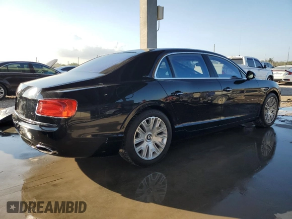 2014 Bentley Flying Spur z VIN SCBEC9ZA2EC090466, wystawiony jako Copart lot #43833305 z przebiegiem 53 837 mil mil oraz Szkody całkowita. Historia ofert i sprzedaży dostępna na DreamBid. Obrazek 3.
