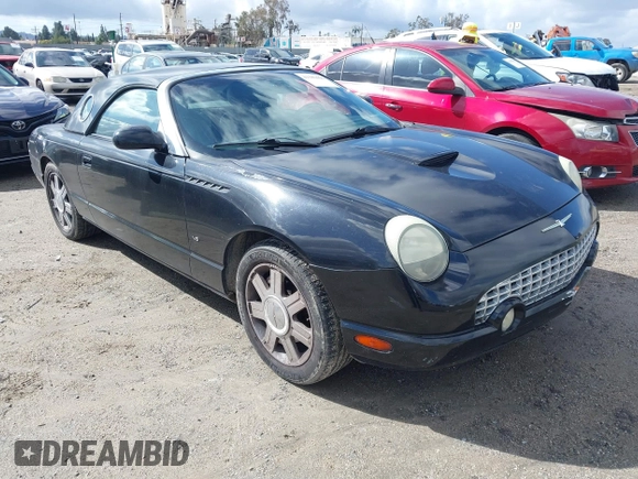 2004 Ford Thunderbird Deluxe z VIN 1FAHP60A64Y101843, wystawiony jako IAAI lot #41582696 z przebiegiem 146 492 mil mil oraz . Historia ofert i sprzedaży dostępna na DreamBid. Obrazek 1.
