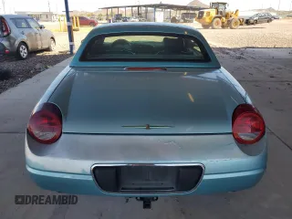 2002 Ford Thunderbird Hardtop Premium z VIN 1FAHP60A22Y109399, wystawiony jako Copart lot #61760324 z przebiegiem 137 158 mil mil oraz Szkoda całkowita • Salvage title. Historia ofert i sprzedaży dostępna na DreamBid. Obrazek 6.