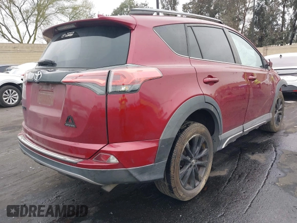 2018 Toyota RAV4 XLE with VIN 2T3RFREVXJW699293, listed as a IAAI auction lot 41881742 with Not Provided miles and . Bid and sale history available at DreamBid. Image 4.