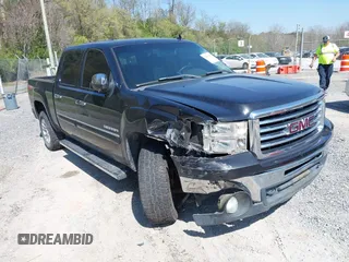 2010 GMC Sierra 1500 SLT with VIN 3GTRCWE09AG122055, listed as a IAAI auction lot 42064233 with 266,560 mi miles and . Bid and sale history available at DreamBid. Image 1.