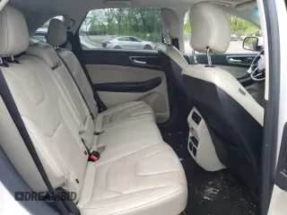 2015 Ford Edge Titanium z VIN 2FMPK4K88FBC05216, wystawiony jako Copart lot #56523475 z przebiegiem 156 558 mil mil oraz Szkoda całkowita • Salvage title. Historia ofert i sprzedaży dostępna na DreamBid. Obrazek 11.