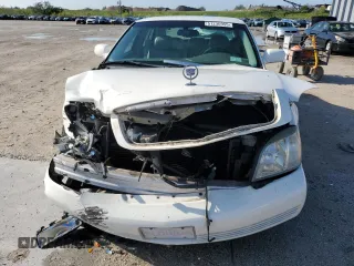 2004 Cadillac DeVille z VIN 1G6KD57Y14U149606, wystawiony jako Copart lot #51230955 z przebiegiem Nie podano mil oraz Szkoda całkowita • Salvage title. Historia ofert i sprzedaży dostępna na DreamBid. Obrazek 5.