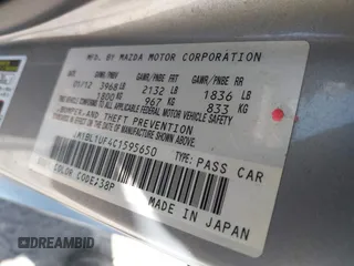 2012 Mazda 3 i Sport with VIN JM1BL1UF4C1595650, listed as a IAAI auction lot 40127921 with 190,421 mi miles and . Bid and sale history available at DreamBid. Image 9.
