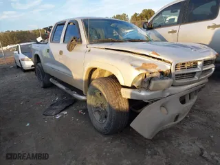 2004 Dodge Dakota SLT with VIN 1D7HL48N74S759634, listed as a IAAI auction lot 41224619 with 1 mi miles. Bid and sale history available at carsss.com. Image 1.