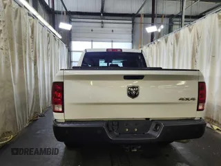 2019 Ram 1500 Tradesman z VIN 1C6RR7KT2KS596286, wystawiony jako IAAI lot #42090663 z przebiegiem 89 330 mil mil oraz . Historia ofert i sprzedaży dostępna na DreamBid. Obrazek 1.
