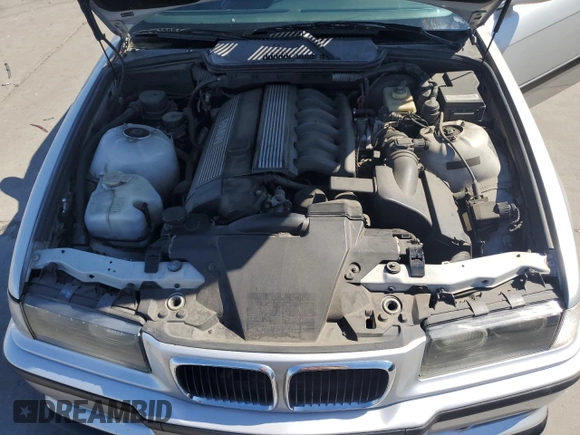 1999 BMW 3 Series 328i with VIN WBABK733XXET68116, listed as a Copart auction lot 66958525 with 116,302 mi miles and Salvage title. Bid and sale history available at DreamBid. Image 11.