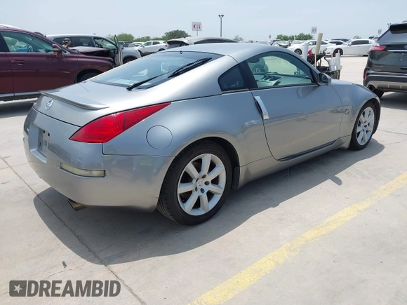 2003 Nissan 350Z Touring with VIN JN1AZ34D33T112077, listed as a IAAI auction lot 42305802 with 202,770 mi miles and . Bid and sale history available at DreamBid. Image 4.