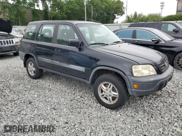 2001 Honda CR-V EX z VIN JHLRD18631S022321, wystawiony jako Copart lot #61043055 z przebiegiem 283 359 mil mil oraz Czysty tytuł • Clean title. Historia ofert i sprzedaży dostępna na DreamBid. Obrazek 4.