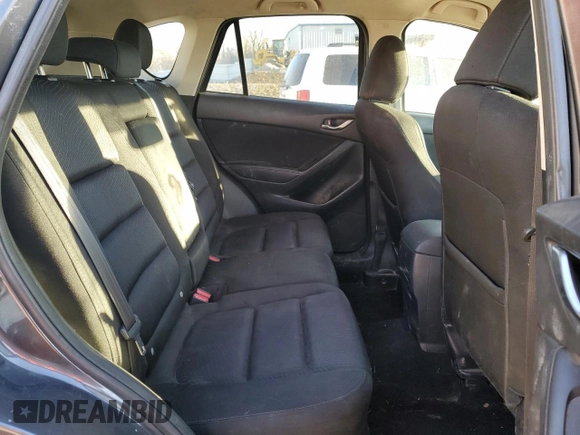2015 Mazda CX-5 Touring with VIN JM3KE2CY0F0439125, listed as a Copart auction lot 43324945 with 210,404 mi miles and Clean Title. Bid and sale history available at DreamBid. Image 11.