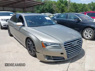 2012 Audi A8 with VIN WAURVAFD1CN010078, listed as a IAAI auction lot 42768475 with 140,384 mi miles and . Bid and sale history available at DreamBid. Image 1.