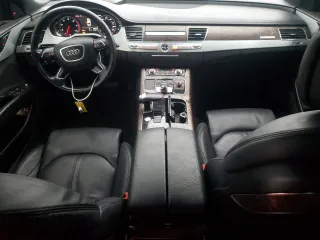 2015 Audi A8 z VIN WAUJGAFD0FN010021, wystawiony jako Copart lot #86861684 z przebiegiem 112 697 mil mil oraz Szkoda całkowita • Salvage title. Historia ofert i sprzedaży dostępna na DreamBid. Obrazek 8.
