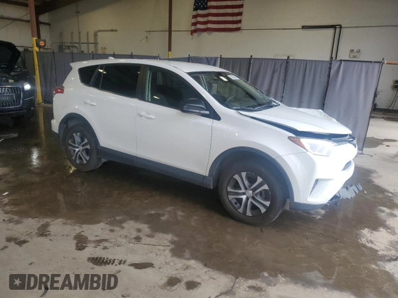 2018 Toyota RAV4 LE with VIN JTMBFREV2JJ182828, listed as a Copart auction lot 55668945 with 164,683 mi miles and Salvage Title. Bid and sale history available at DreamBid. Image 4.