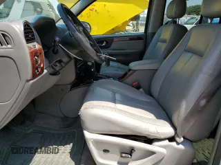 2006 GMC Envoy SLE z VIN 1GKDT13S762345183, wystawiony jako Copart lot #60096645 z przebiegiem 249 658 mil mil oraz Szkoda całkowita • Salvage title. Historia ofert i sprzedaży dostępna na DreamBid. Obrazek 7.