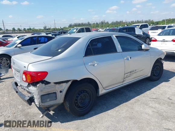 2010 Toyota Corolla with VIN 1NXBU4EE2AZ240438, listed as a IAAI auction lot 42125407 with 185,253 mi miles and . Bid and sale history available at DreamBid. Image 4.