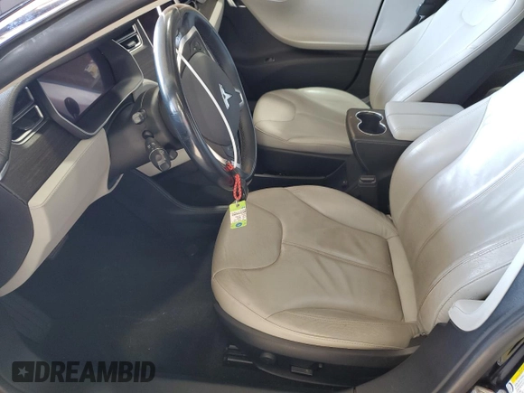 2014 Tesla Model S 60 with VIN 5YJSA1H16EFP43523, listed as a Copart auction lot 63291145 with Not provided miles and Clean title. Bid and sale history available at DreamBid. Image 7.