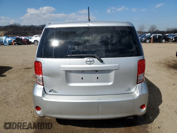 2012 Scion xB with VIN JTLZE4FE1CJ009084, listed as a Copart auction lot 50447785 with 74,155 mi miles and Salvage Title. Bid and sale history available at carsss.com. Image 6.
