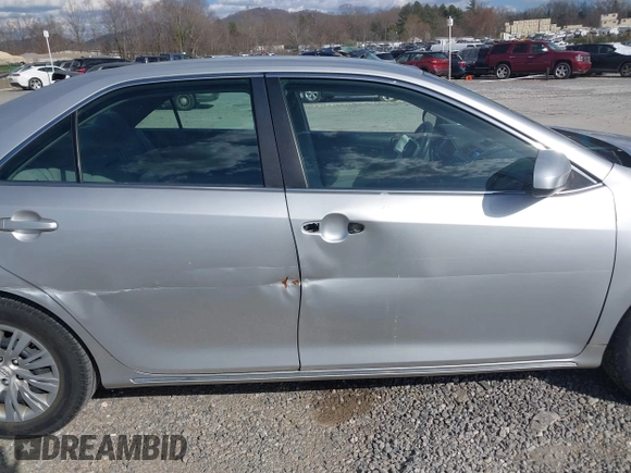 2014 Toyota Camry L with VIN 4T1BF1FK3EU301041, listed as a IAAI auction lot 41858386 with 136,998 mi miles and . Bid and sale history available at DreamBid. Image 14.