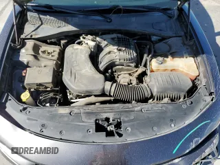 2015 Dodge Charger SXT with VIN 2C3CDXHG9FH856319, listed as a Copart auction lot 57251335 with 171,454 mi miles and Salvage title. Bid and sale history available at DreamBid. Image 11.