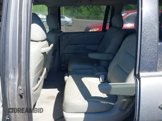 2008 Honda Odyssey EX-L z VIN 5FNRL38768B063991, wystawiony jako IAAI lot #42009031 z przebiegiem 167 524 mil mil oraz . Historia ofert i sprzedaży dostępna na DreamBid. Obrazek 8.