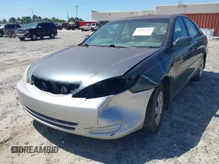 2002 Toyota Camry LE z VIN 4T1BE32K02U587544, wystawiony jako IAAI lot #42291358 z przebiegiem Nie podano mil oraz . Historia ofert i sprzedaży dostępna na DreamBid. Obrazek 6.