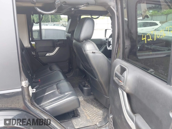 2014 Jeep Wrangler Unlimited Sahara with VIN 1C4HJWEG8EL292835, listed as a IAAI auction lot 42705672 with 176,769 mi miles and . Bid and sale history available at DreamBid. Image 8.