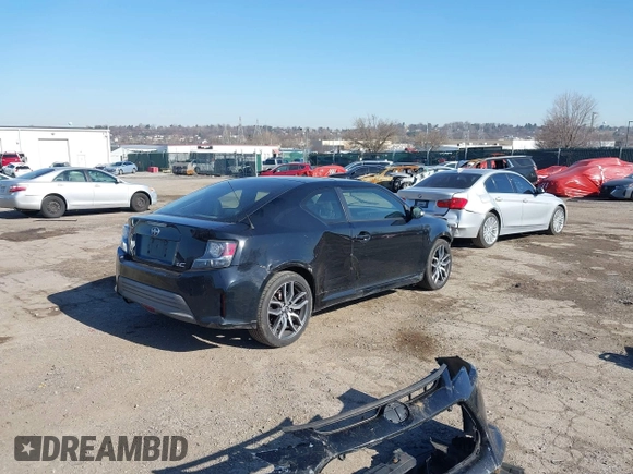 2014 Scion tC with VIN JTKJF5C78E3074094, listed as a IAAI auction lot 41828785 with 164,976 mi miles. Bid and sale history available at carsss.com. Image 4.