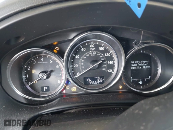 2014 Mazda CX-5 Grand Touring with VIN JM3KE2DY6E0394172, listed as a IAAI auction lot 41698468 with 89,554 mi miles. Bid and sale history available at carsss.com. Image 7.