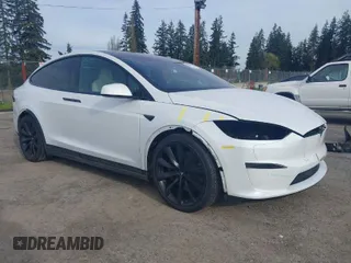 2022 Tesla Model X with VIN 7SAXCBE54NF363113, listed as a IAAI auction lot 41978397 with 27,166 mi miles. Bid and sale history available at carsss.com. Image 1.