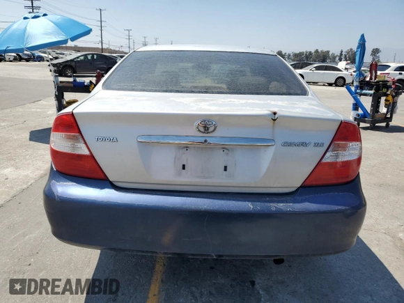 2004 Toyota Camry LE with VIN 4T1BE32K94U300544, listed as a Copart auction lot 60529005 with 223,940 mi miles and Clean title. Bid and sale history available at DreamBid. Image 6.