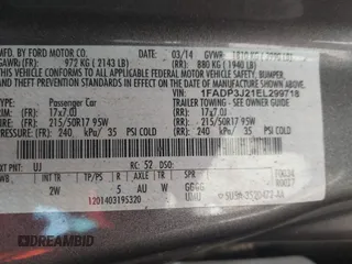 2014 Ford Focus Titanium with VIN 1FADP3J21EL299718, listed as a IAAI auction lot 41788080 with 91,748 mi miles. Bid and sale history available at carsss.com. Image 9.
