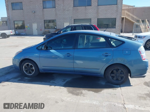 2008 Toyota Prius z VIN JTDKB20U687712324, wystawiony jako IAAI lot #41879892 z przebiegiem 270 900 mil mil oraz . Historia ofert i sprzedaży dostępna na DreamBid. Obrazek 14.