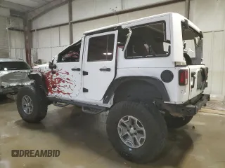 2017 Jeep Wrangler Unlimited Rubicon Recon with VIN 1C4BJWFG3HL577788, listed as a Copart auction lot 82932034 with 142,752 mi miles and Salvage title. Bid and sale history available at DreamBid. Image 2.