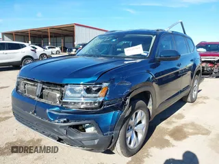2019 Volkswagen Atlas SE with VIN 1V2DR2CA9KC506188, listed as a IAAI auction lot 41221389 with 67,593 mi miles and . Bid and sale history available at DreamBid. Image 2.