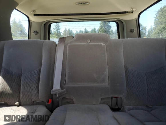 2004 Chevrolet Tahoe LS with VIN 1GNEC13V24J321605, listed as a Copart auction lot 64476065 with 176,551 mi miles and Salvage title. Bid and sale history available at DreamBid. Image 10.