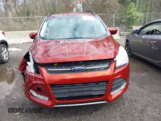 2016 Ford Escape SE with VIN 1FMCU9GXXGUB02932, listed as a IAAI auction lot 41797351 with 74,284 mi miles. Bid and sale history available at carsss.com. Image 12.