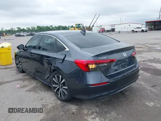 2023 Honda Civic EX with VIN 2HGFE1F73PH312228, listed as a IAAI auction lot 42185408 with 19,339 mi miles and . Bid and sale history available at DreamBid. Image 3.