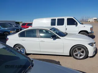 2014 BMW 3 Series 328i xDrive with VIN WBA3B3C56EJ981496, listed as a IAAI auction lot 41822862 with 137,700 mi miles. Bid and sale history available at carsss.com. Image 13.