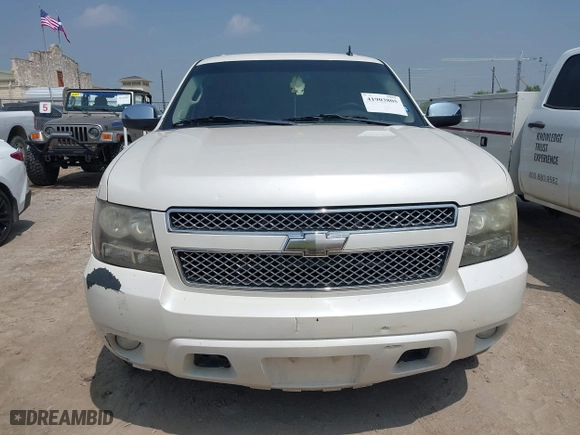 2011 Chevrolet Suburban LTZ with VIN 1GNSCKE06BR207874, listed as a IAAI auction lot 41903805 with 288,007 mi miles. Bid and sale history available at carsss.com. Image 12.