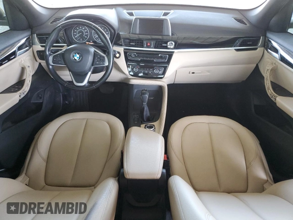 2017 BMW X1 xDrive28i with VIN WBXHT3C35H5F73546, listed as a Copart auction lot 59544545 with 125,185 mi miles and Salvage title. Bid and sale history available at DreamBid. Image 8.