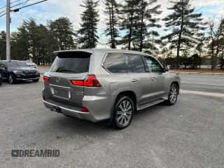 2016 Lexus LX 570 with VIN JTJHY7AX7G4203810, listed as a Copart auction lot 86017494 with 296,703 mi miles and Clean Title. Bid and sale history available at DreamBid. Image 4.