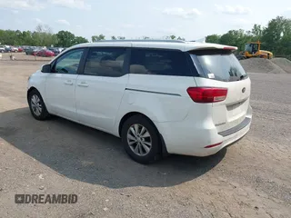 2016 Kia Sedona LX z VIN KNDMB5C16G6125279, wystawiony jako IAAI lot #42477509 z przebiegiem 114 430 mil mil oraz . Historia ofert i sprzedaży dostępna na DreamBid. Obrazek 3.